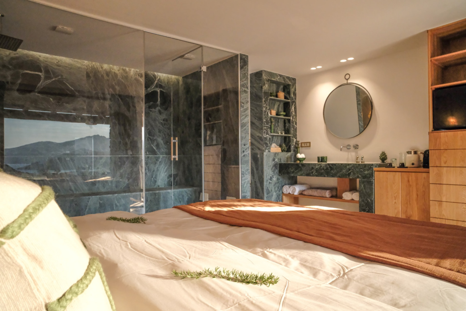 The bedroom of the Hammam Guest House, open to the marble bathing space