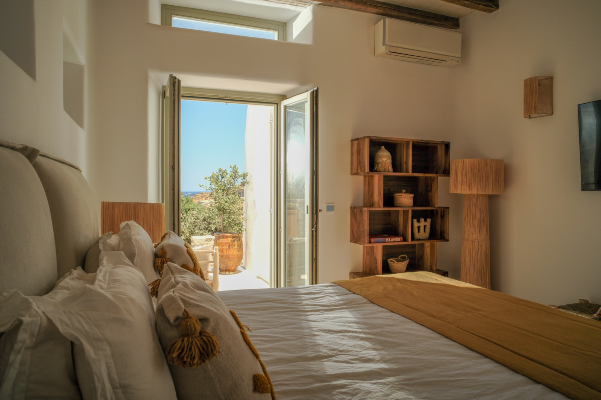 The Upper Suite opening onto the private terrace and sea
