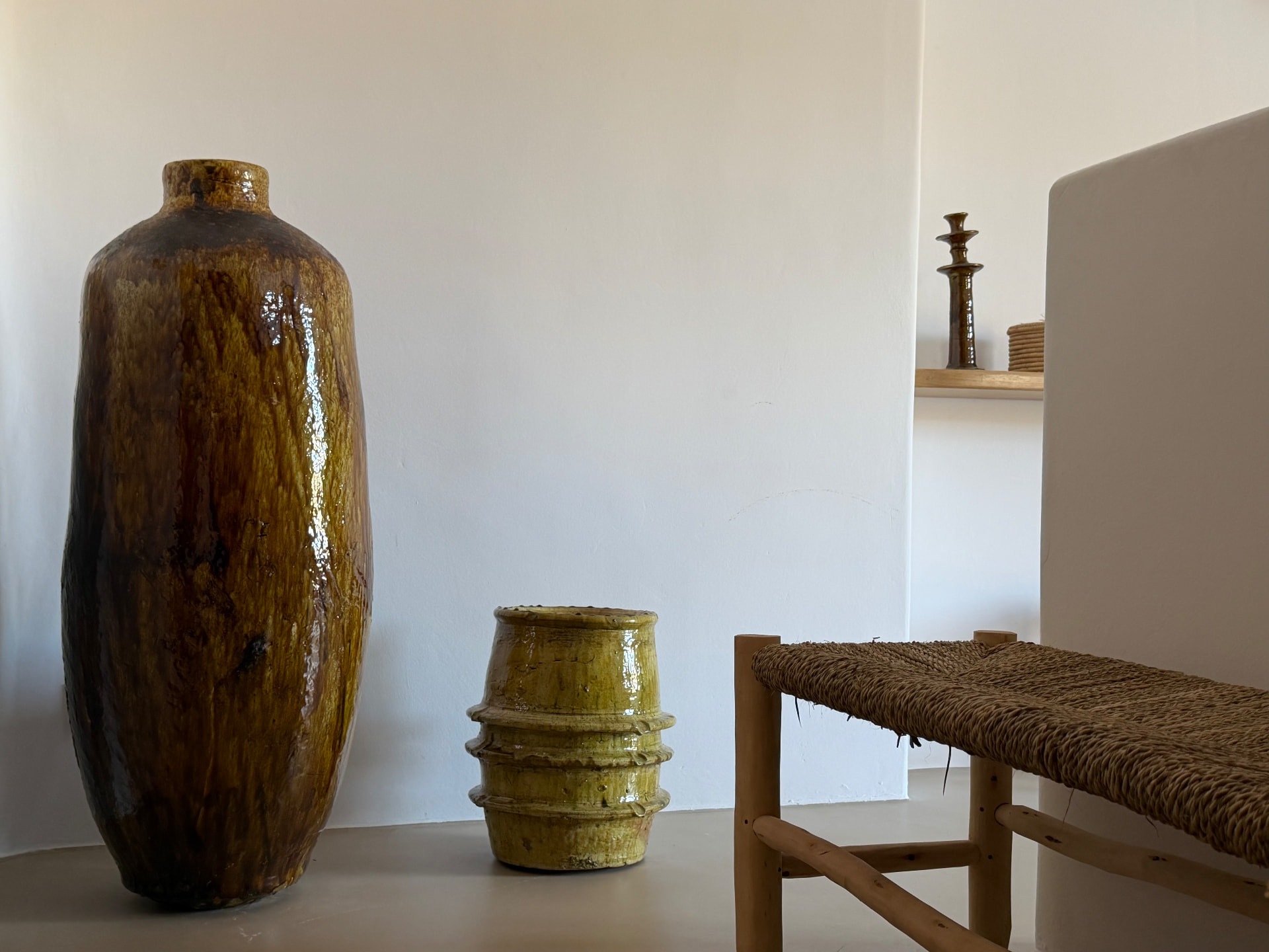 Glazed ceramics and woven seating in the Master Suite