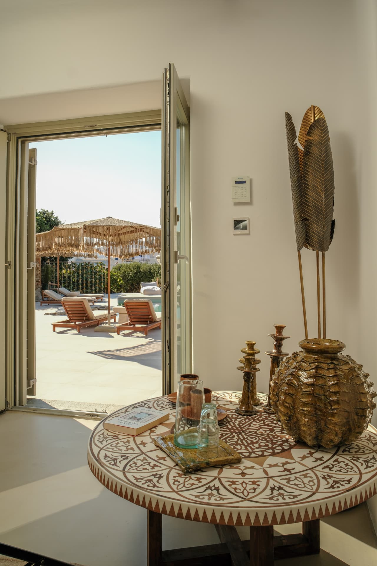 Looking from the Master Suite interior toward the terrace and pool
